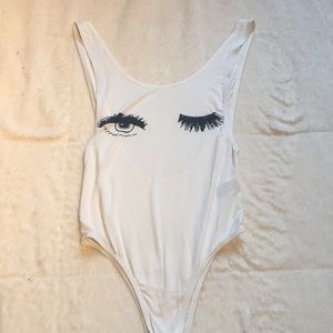Winking eyes bodysuit